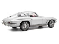 1963 Chevrolet Corvette Sting Ray Sebring Silver Metallic with Red Interior 1/18 Diecast Model Car by Norev