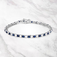 6.87 ct. t.w. Blue Sapphire and White Topaz Bracelet in Sterling Silver