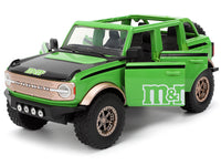 2021 Ford Bronco Green with Black Stripes and Green M&M's Diecast Figure "Hollywood Rides" Series 1/24 Diecast Model Car by Jada