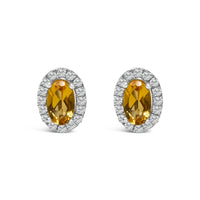 10K White Gold 5x3 MM Oval Purple Amethyst and Diamond Halo Stud Earrings (I-J Color, I1-I2 Clarity)