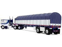 Peterbilt 352 COE 110" Sleeper and 53' Wilson Roadbrute Flatbed Trailer with Covered Wagon White with Blue Stripes 1/64 Diecast Model by DCP/First Gear