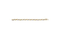 10K Yellow and White Gold 1/2 Cttw Channel Set Diamond Infinity Link 7" Tennis Bracelet (H-I Color, I1-I2 Clarity)
