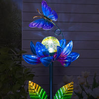 sunnylight solar wind spinner with purple petals and cracked glass ball