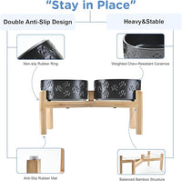 SPUNKYJUNKY Elevated Dog Bowls Ceramic, 7.3'' Dogs Food Water Bowls Raised with Non-Slip Bamboo Stand for Medium to Large Sized Breed Microwave Dishwasher Safe - 42 OZ,Paw Black