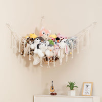 Lilly's Love white macrame stuffed animal hammock hanging in a bedroom corner - view 22