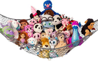 Lilly's Love white macrame stuffed animal hammock hanging in a bedroom corner - view 4