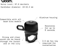 woom VIENNA kids bike bell in brass mounted on a children's bike handlebar - view 3