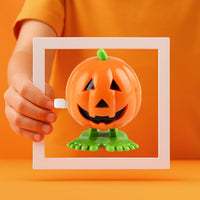 The Dreidel Company 2 inch Halloween pumpkin wind-up toys, 3 pack - view 3