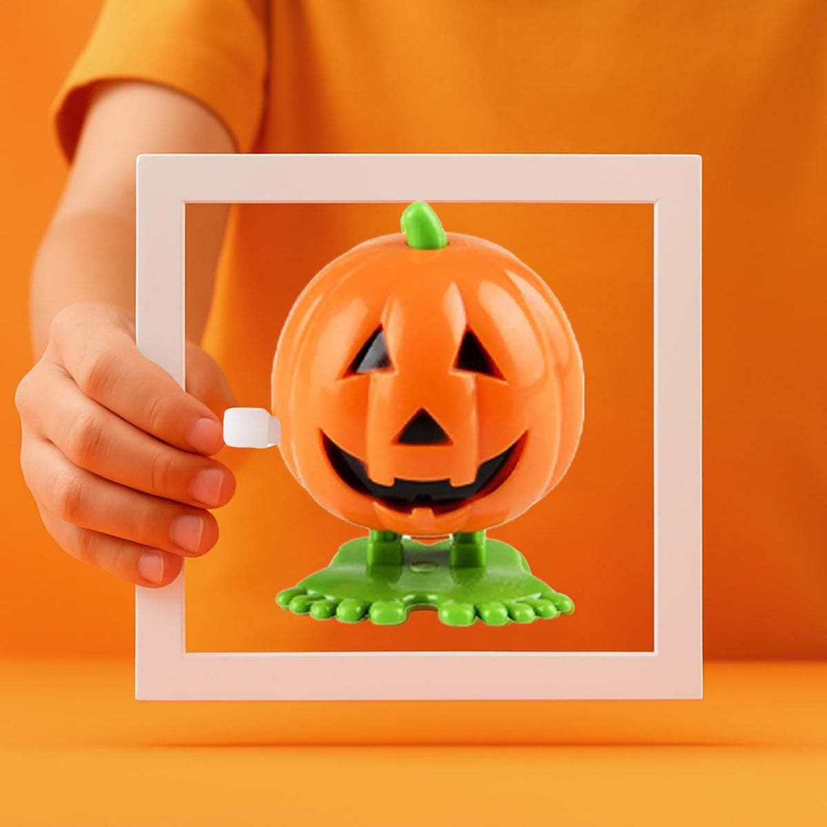 The Dreidel Company 2 inch Halloween pumpkin wind-up toys, 3 pack - view 3
