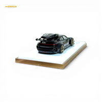 404ERROR Porsche Taycan Black with Roof Box 1:64