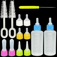 Pet nursing bottle kit with 2 squeeze bottles, 10 silicone nipples and brushes