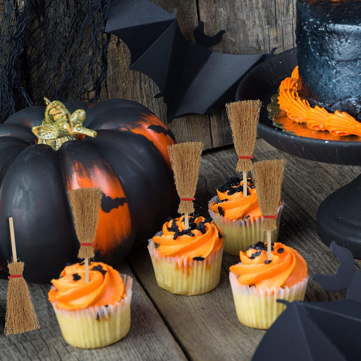 Cindeer mini witch brooms with straw heads, wooden handles and red rope ties - view 5