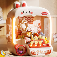 Vanvimen kids claw machine with dinosaur theme, joysticks and mini prizes inside