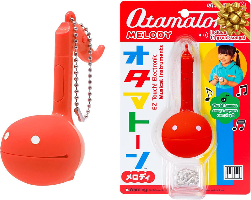 Otamatone Melody musical electronic instrument toy keychain in lime green note shape