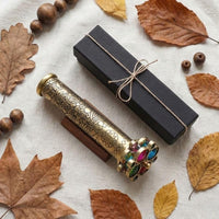 Roorkee Instruments etched floral brass kaleidoscope with two bead wheels on a hardwood stand - view 9