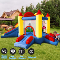 Umbalir bounce house with 3 slides and a double climbing wall, inflated in a backyard - view 3