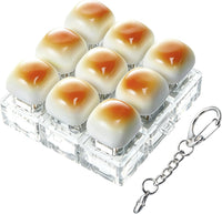 XiawaLangzhuo cat paw keyboard fidget toy, 9-in-1 clicker keychain in white and purple - view 9