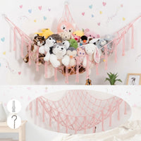 Lilly's Love white macrame stuffed animal hammock hanging in a bedroom corner - view 7