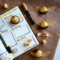 Fifty shiny golden paper wing chocolate decorations for wizard party cupcakes - view 4