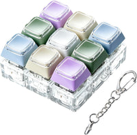 XiawaLangzhuo cat paw keyboard fidget toy, 9-in-1 clicker keychain in white and purple - view 4