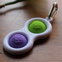 Fat Brain Toys Simpl Dimpl popping fidget keychain in Purple/Lime with silicone bubbles - view 4