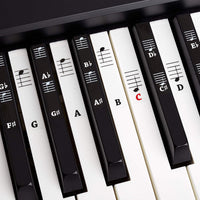Belfort removable piano keyboard stickers with CDEFGAB note labels and beginner piano book
