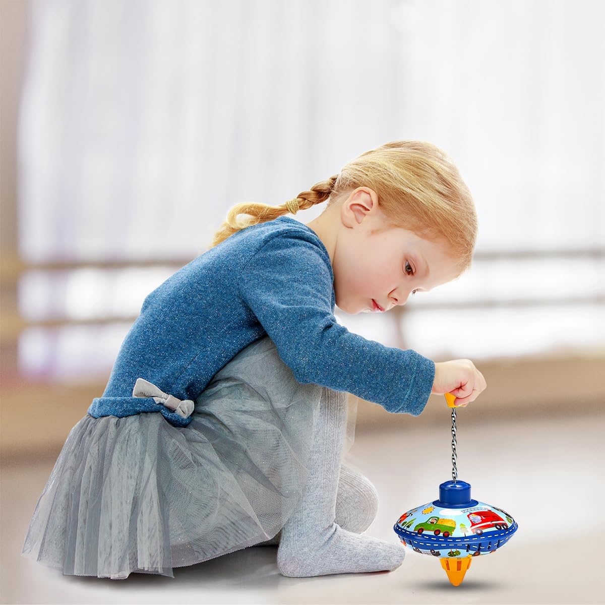 beeqoo retro tin spinning top with colorful vehicle pattern on a plastic stand - view 2