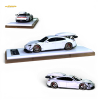 404ERROR Porsche Taycan White with Roof Box 1:64