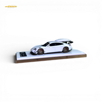 404ERROR Porsche Taycan White with Roof Box 1:64