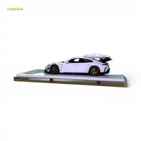 404ERROR Porsche Taycan White with Roof Box 1:64