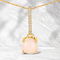0.53 Carat Genuine Ethiopian Opal and White Diamond 10K Yellow Gold Pendant