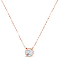 AGS Certified 10K Rose Gold 1/5 Cttw Bezel Set Round Diamond Solitaire 16-18" Adjustable Pendant Necklace (H-I Color, VS1-VS2 Clarity)