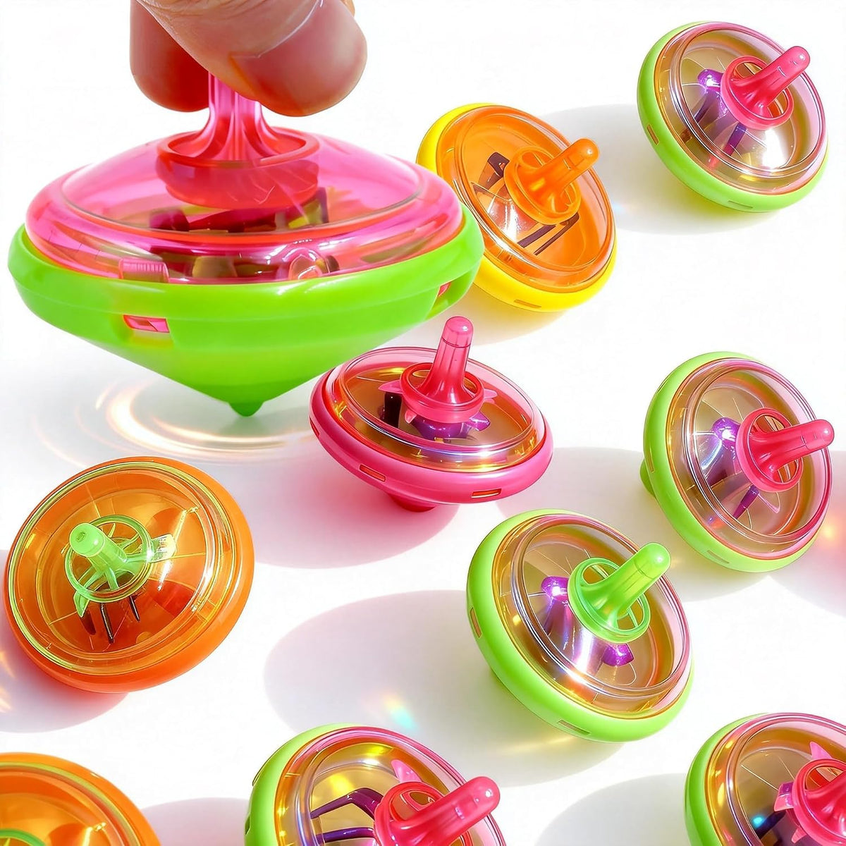 PROLOSO light up spinning tops, 100 pack of LED mini tops in orange, green, yellow and pink - view 3