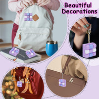 XiawaLangzhuo cat paw keyboard fidget toy, 9-in-1 clicker keychain in white and purple - view 13