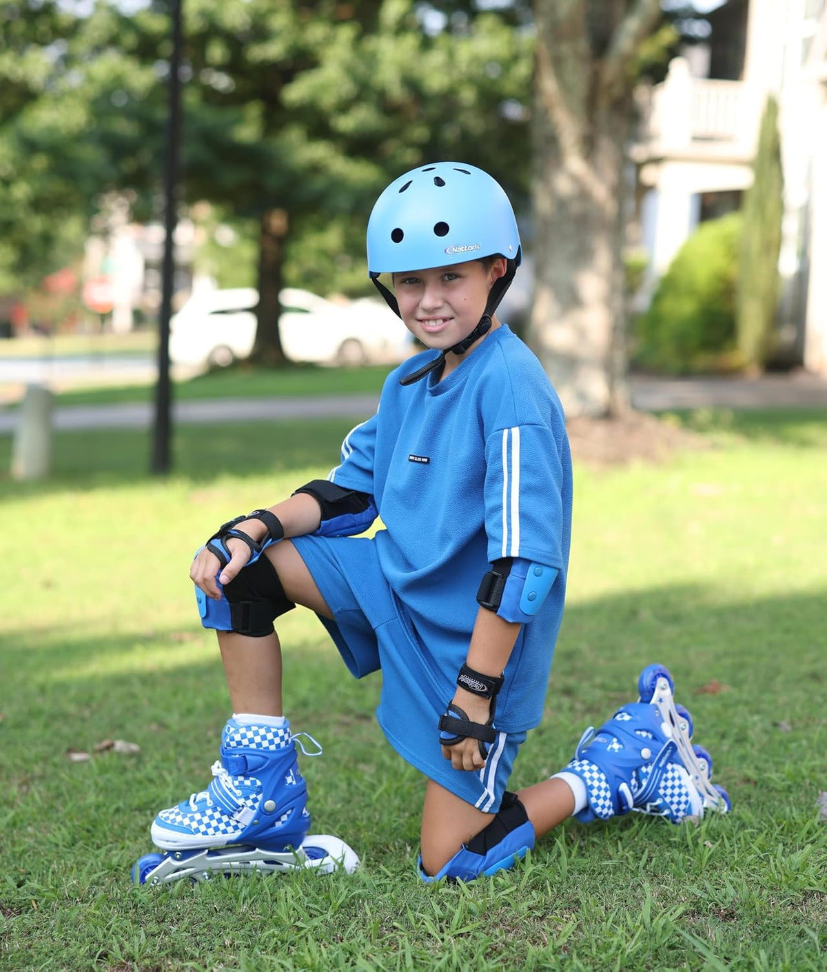Nattork adjustable inline skates for kids with light-up wheels and checkerboard upper - view 13