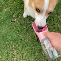 Pink WePet portable dog water bottle, 19 fl oz with one-key water release - view 2