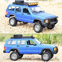 Goolsky silver 1:12 scale RC rock crawler with LED lights on rocky ground - view 3