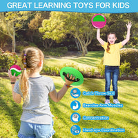 Officygnet ball catch game with pink and green sticky paddles, balls and storage bag - view 7