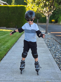 Nattork adjustable inline skates for kids with light-up wheels and checkerboard upper - view 10