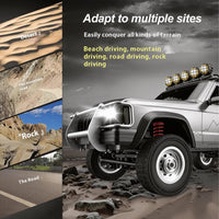 Goolsky silver 1:12 scale RC rock crawler with LED lights on rocky ground - view 8