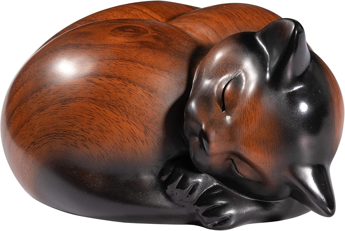 Sleeping resin cat urn for ashes with a lid that seals tightly