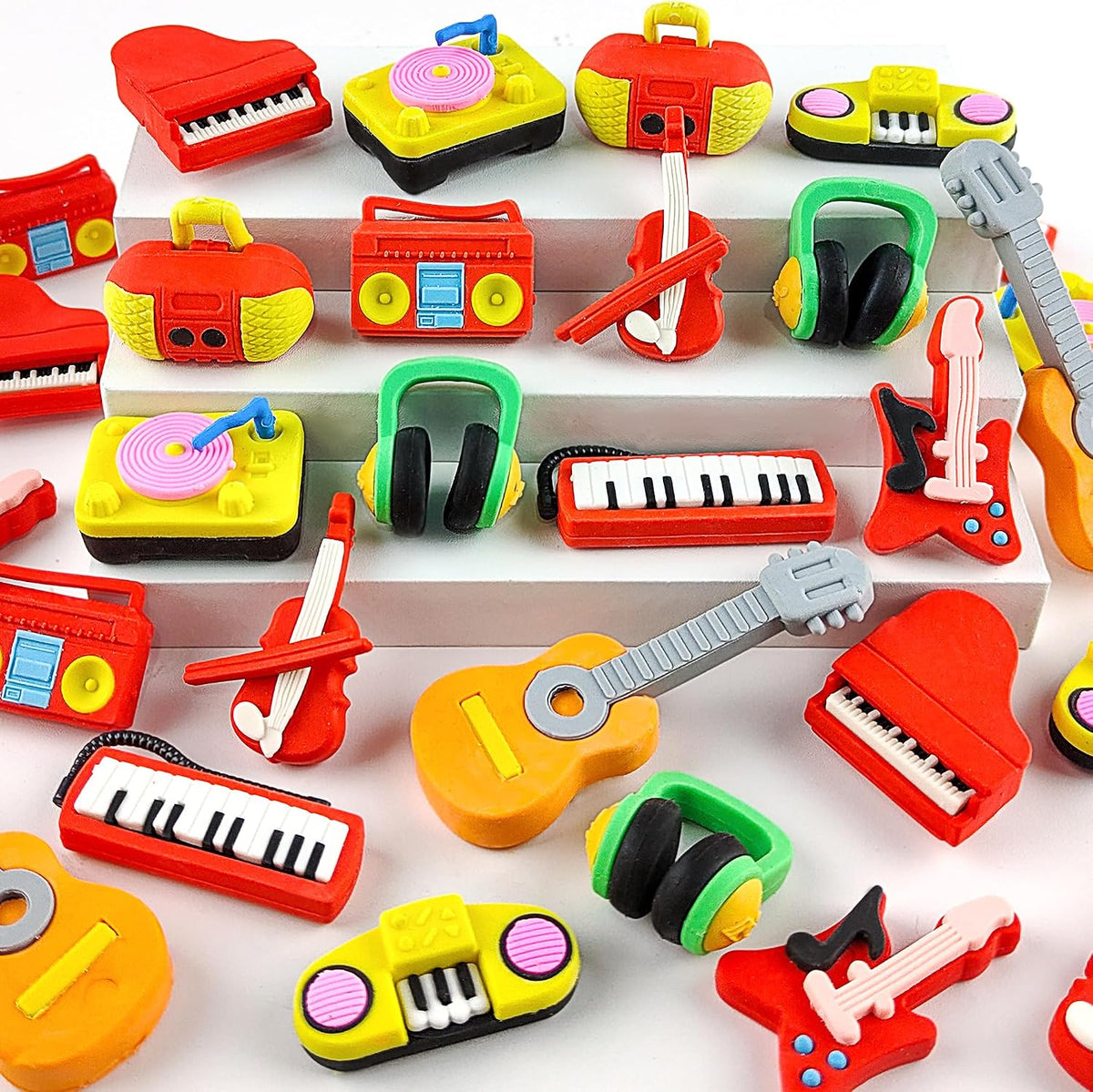 Satomoto musical puzzle erasers shaped like guitars, pianos, violins and gramophones