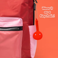 Otamatone Melody musical electronic instrument toy keychain in lime green note shape - view 5