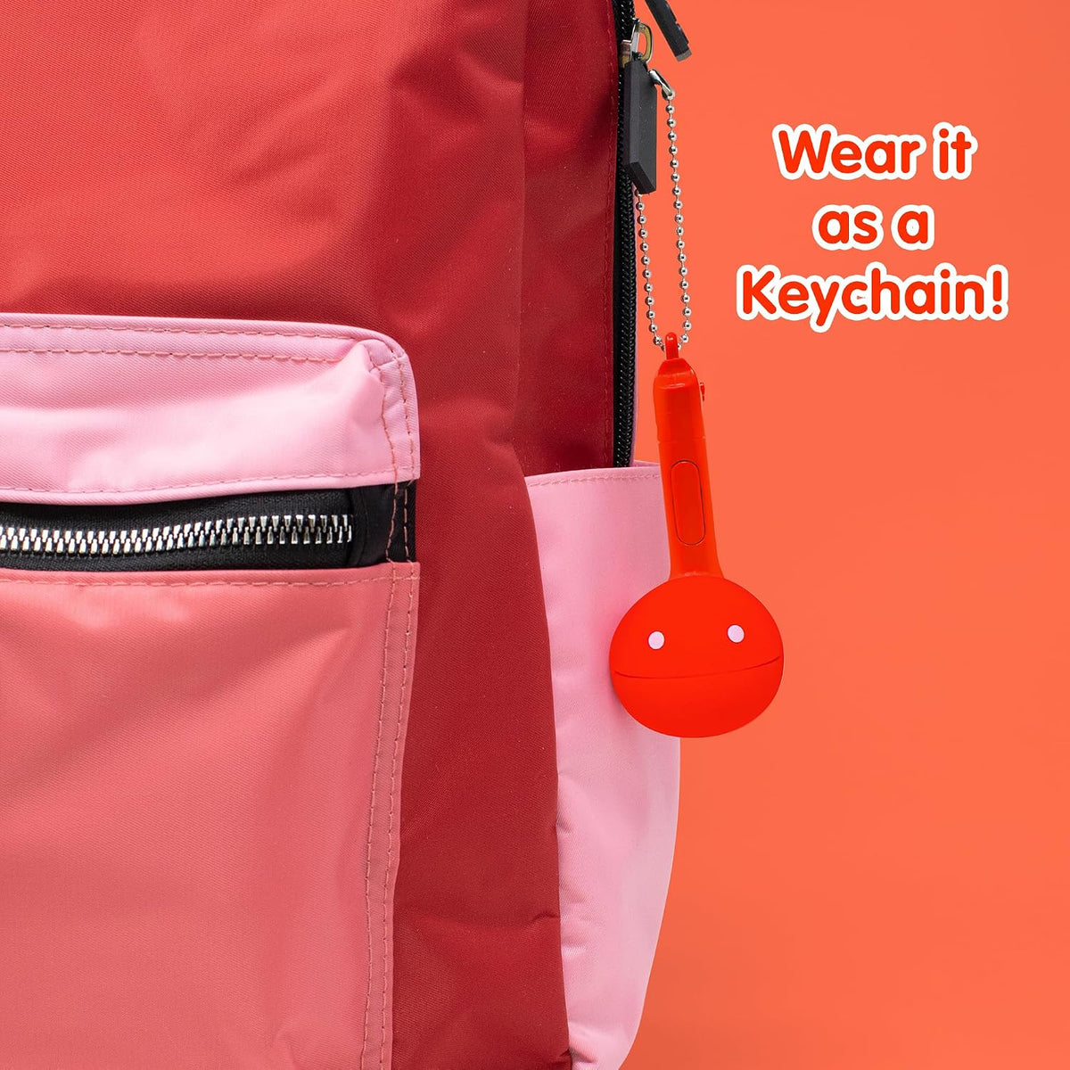 Otamatone Melody musical electronic instrument toy keychain in lime green note shape - view 5