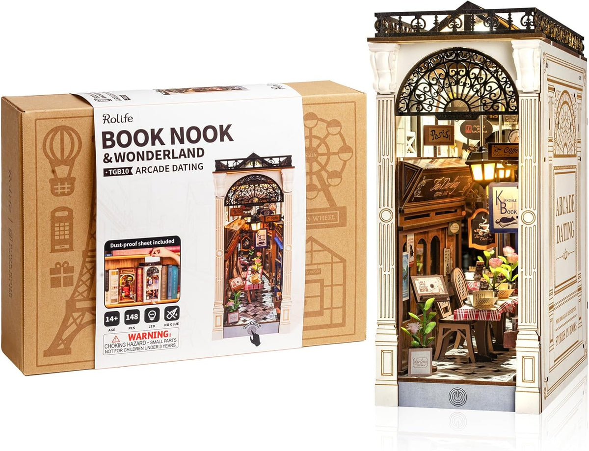 Rolife Arcade Dating book nook kit with LED lights on a bookshelf