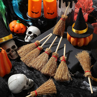 Cindeer mini witch brooms with straw heads, wooden handles and red rope ties - view 7