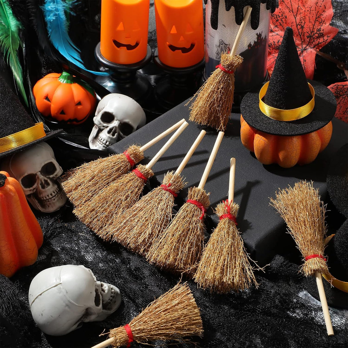 Cindeer mini witch brooms with straw heads, wooden handles and red rope ties - view 7