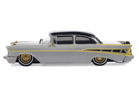 1957 Chevrolet Bel Air Lowrider Gray with Black Top and Gold Accents 1/64 Diecast Model Car by IXO Models