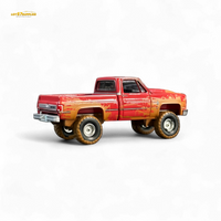 Auto World 1983 Chevrolet Silverado K10 Lifted 1:64