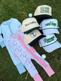 He's Golfing - Green Vintage Trucker Hat